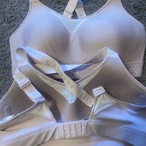 Under Armour Sport Bras. 2 never worn. One still has the tag. Size Large.